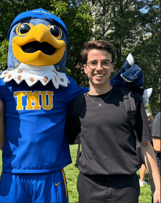 Arthur Sabalski with TMU Mascot Frankie the Falcon