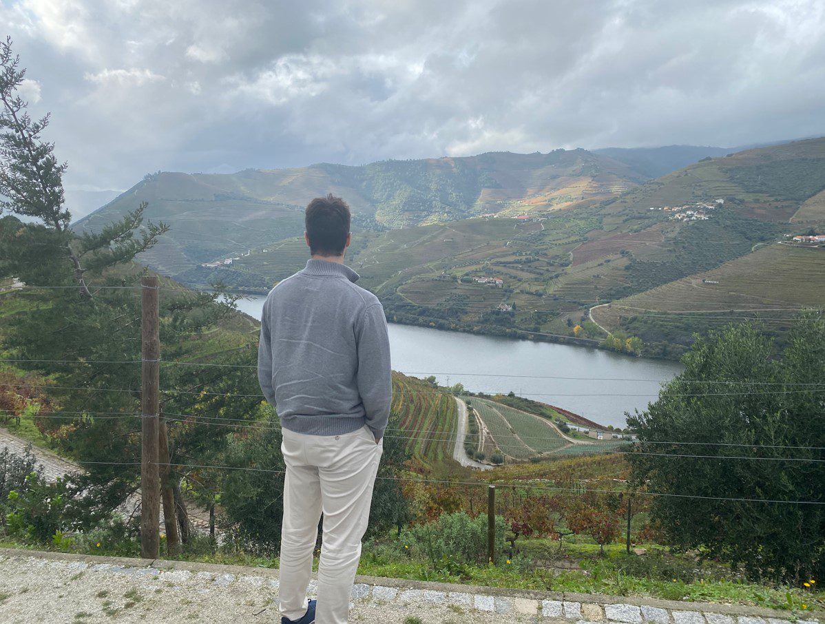 Dean Nina overlooking mountains in Spain